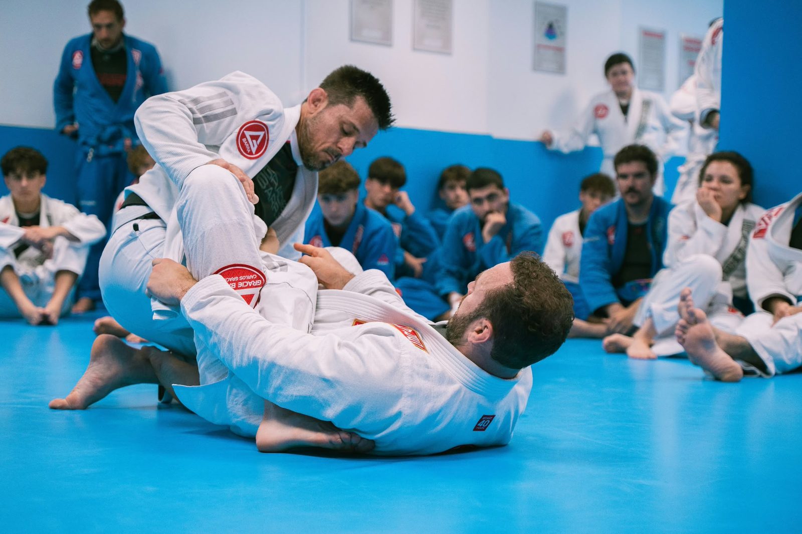 Two students training Brazilian Jiu-Jitsu